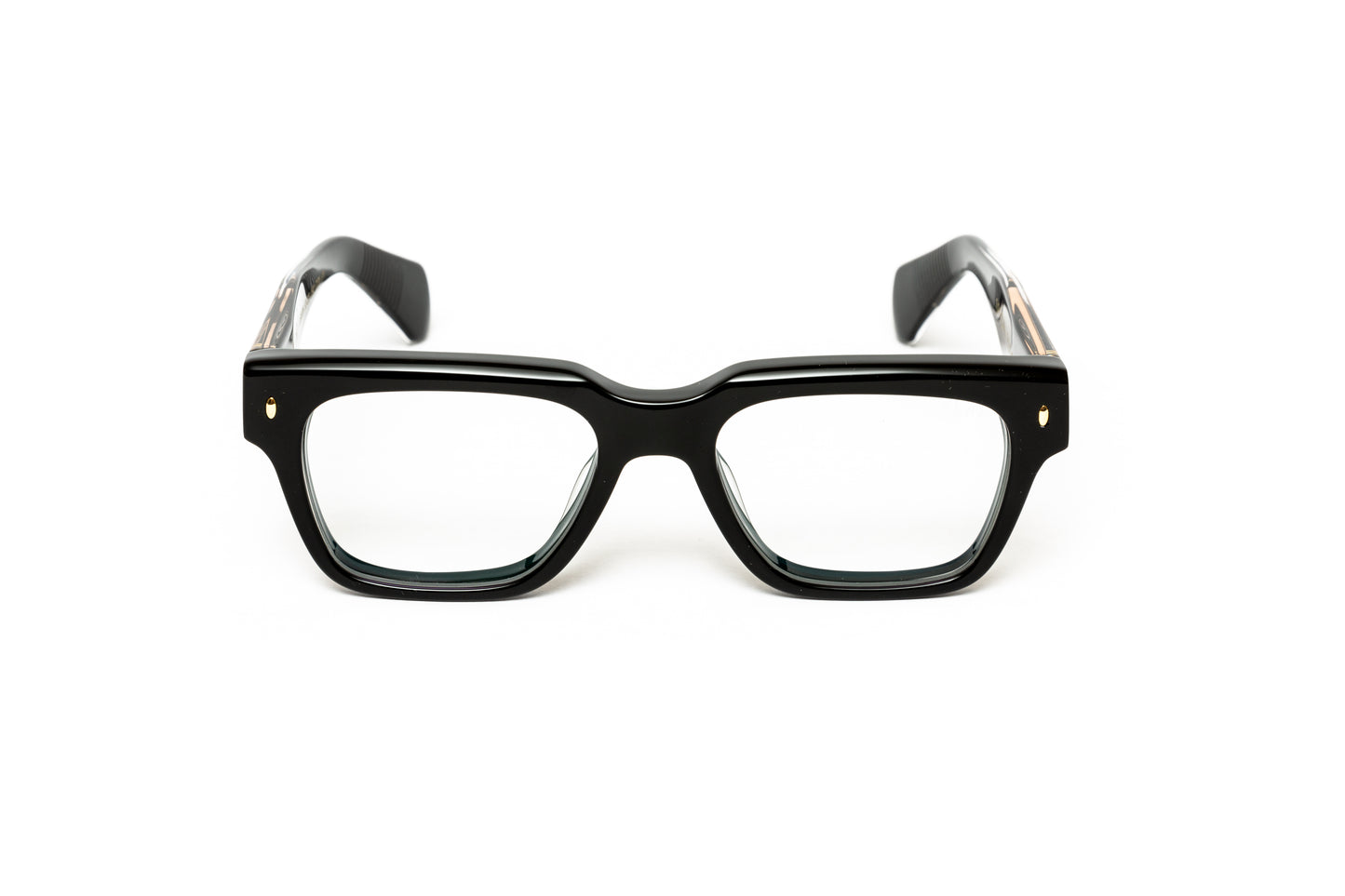 side view of men's square thick black acetate glasses with 18 karat gold wire core similar to cutler and gross