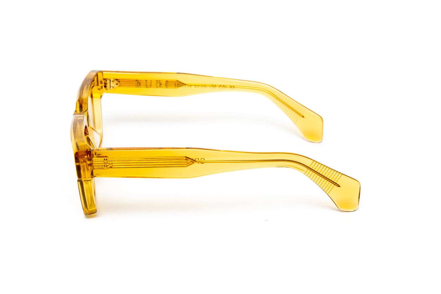 side view of men's square transparent yellow acetate glasses with 18 karat gold wire core