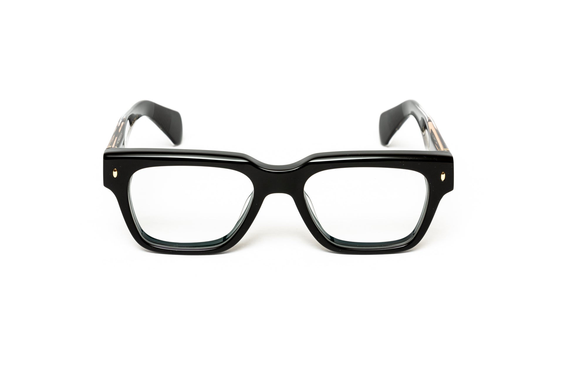 side view of men's square thick black acetate glasses with 18 karat gold wire core similar to cutler and gross